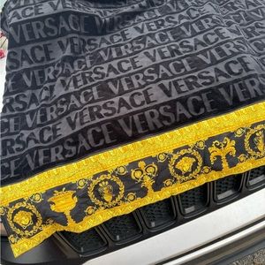 Black VERSACE towel